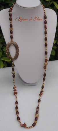 Collana lunga con almeno 3 possibilità per indossarla. Perle di vetro, perle di fiume golden, cristalli boemia, perle del sole, Swarovsky originali applicati  sulla filigrana